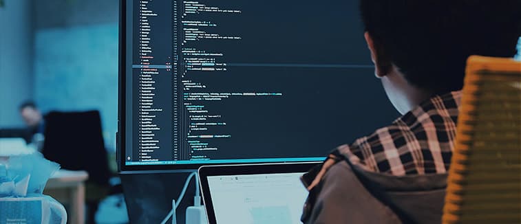 computer with code on screen